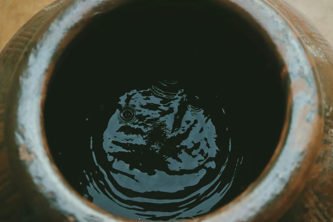 Close-up of a drain with running water