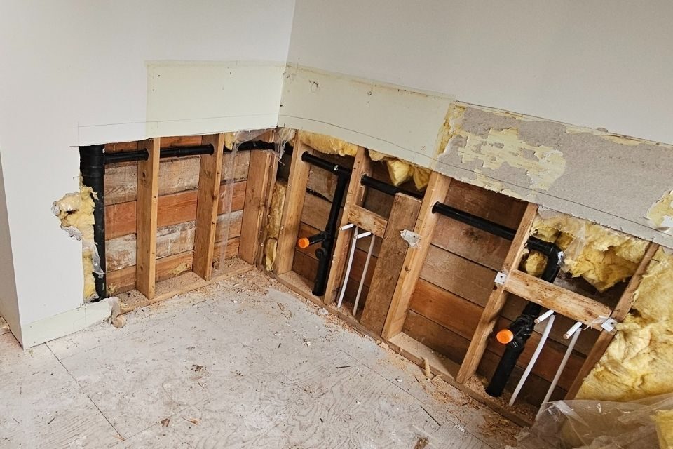 Bathroom opened up for a plumbing renovation
